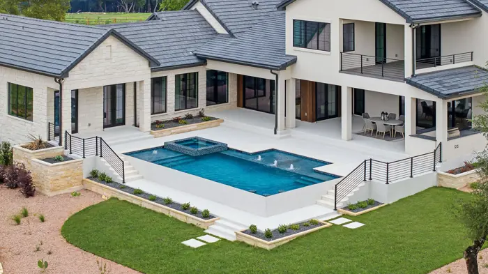Backyard pool and equipment area at a fully serviced Hill Country home